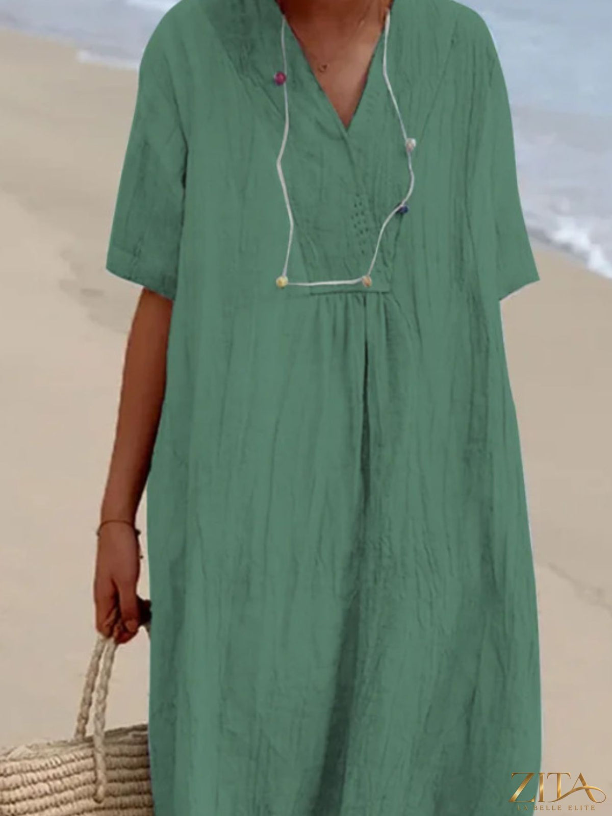 Casual loose short sleeve midi dress by Zita La Belle Elite, featuring a relaxed fit and soft fabric in a stylish design.