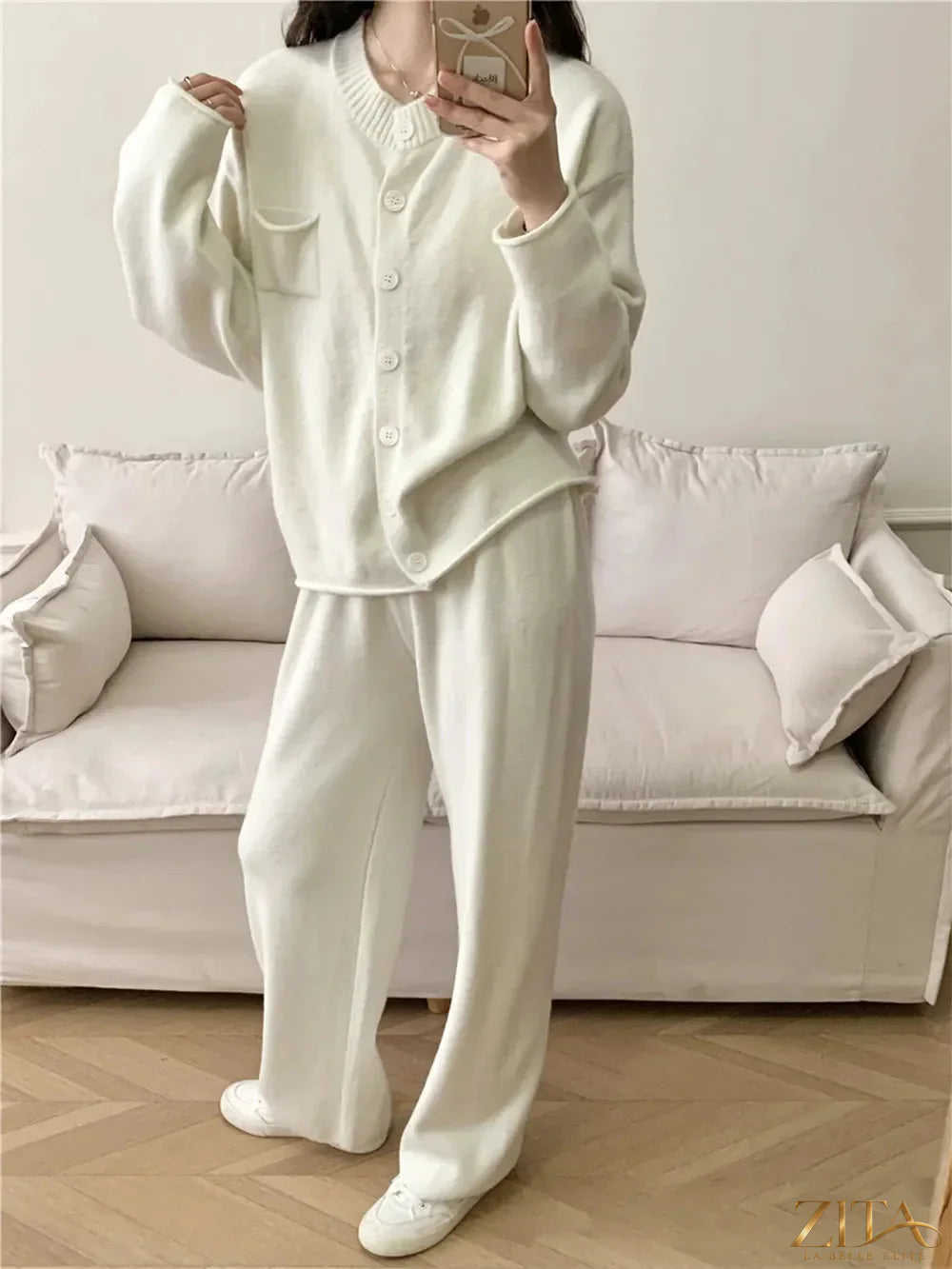 Zita La Belle Elite pocketed round neck button-up cardigan and pants sweater set, featuring a cozy knit design and matching buttons.