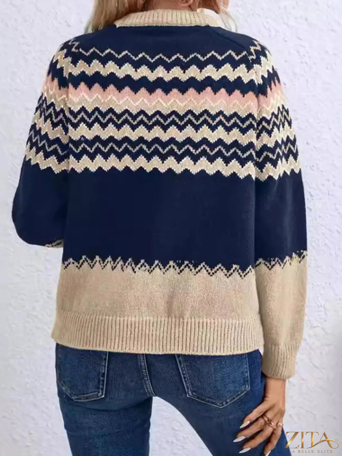 Trendsi geometric pattern knitted sweater featuring bold shapes and cozy fabric, shown in a close-up view.