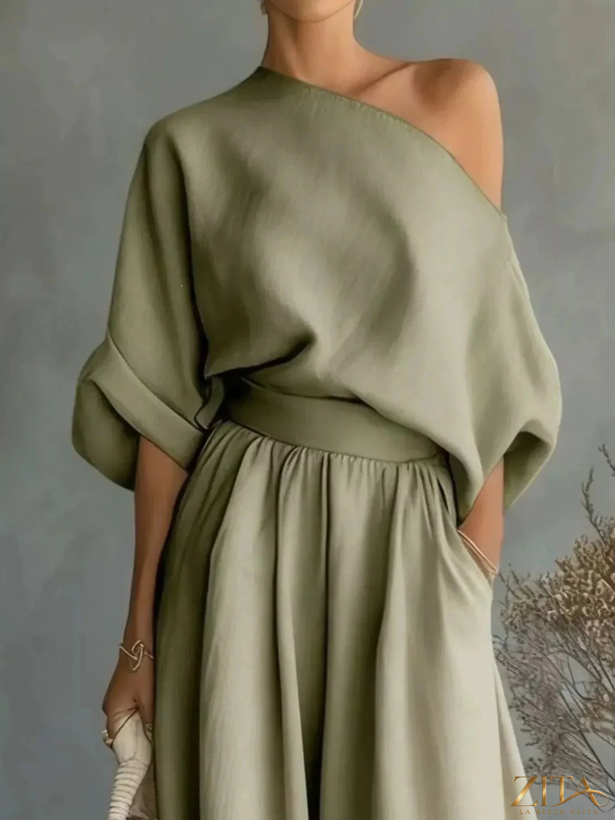 Plus size Zita La Belle Elite one-shoulder top and wide-leg pants set, featuring a stylish, coordinated fashion look.