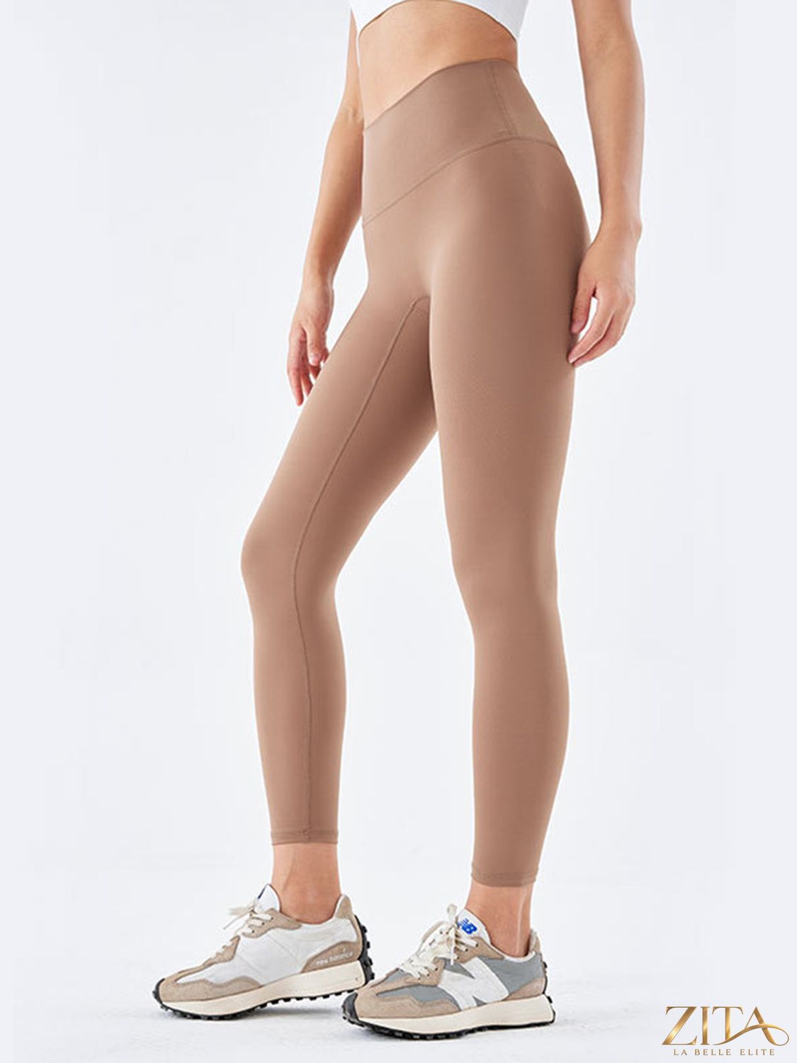 Trendsi wide waistband sports leggings in black, showing a close-up of the high-rise waistband and stretchy fabric for active wear.