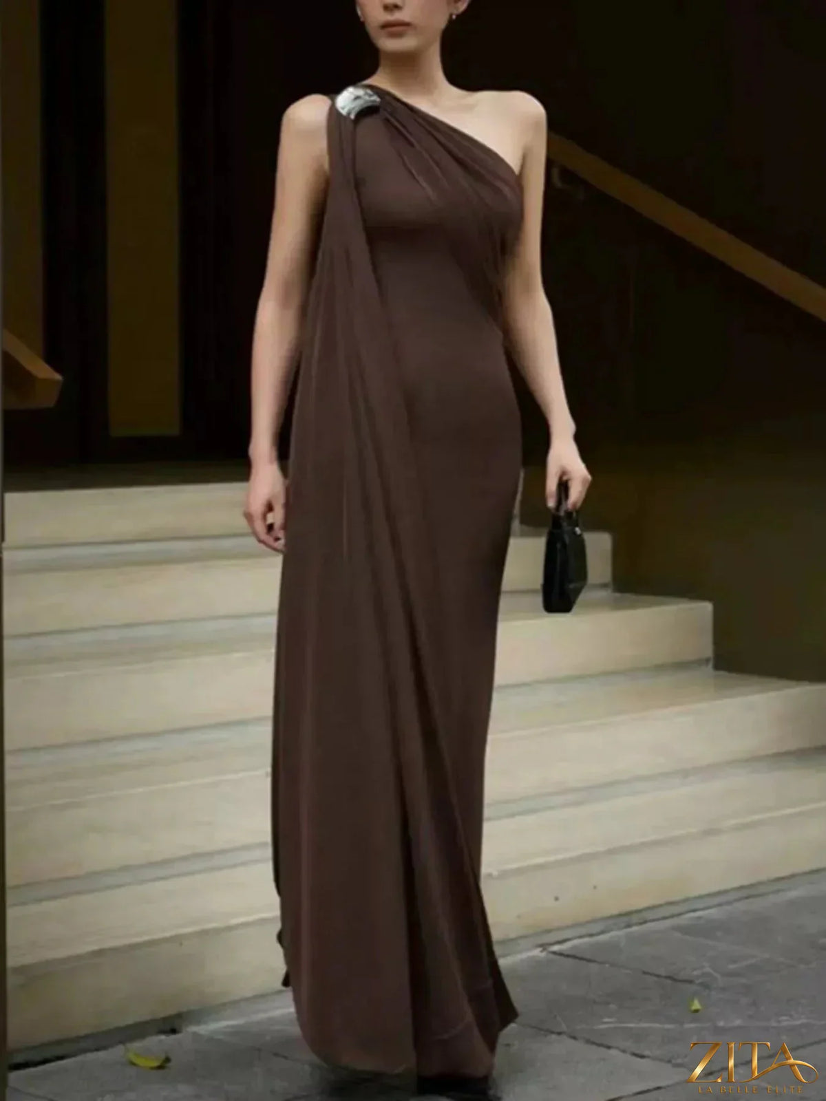 Elegant one-shoulder draped maxi dress by Zita La Belle Elite, flowing fabric with stylish shoulder design.