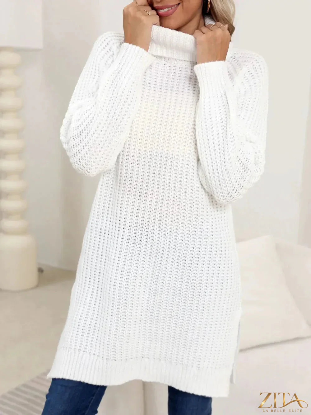 Trendsi slit turtleneck long sleeve sweater in soft knit fabric, featuring a high neckline and stylish side slit detail.