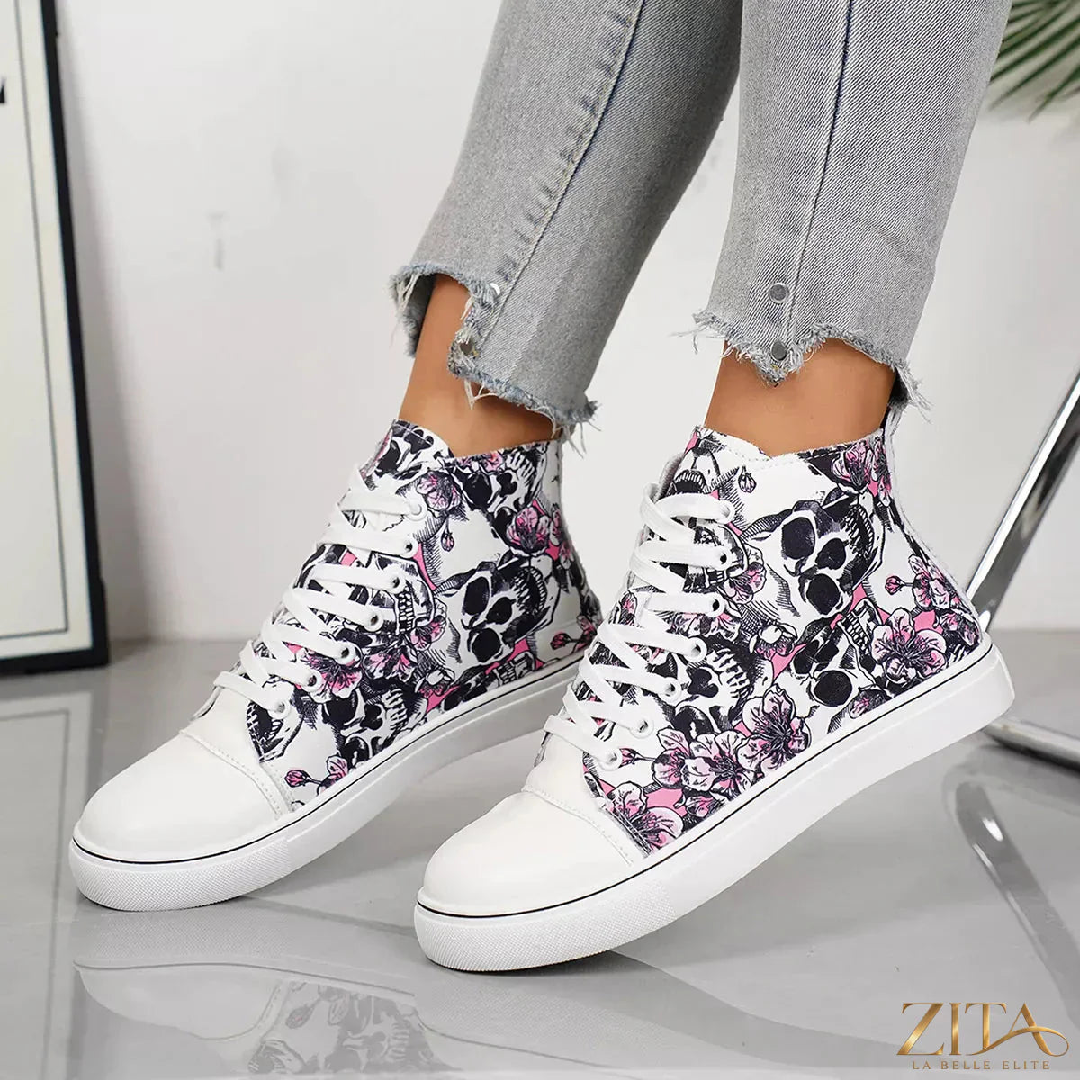 Zita La Belle Elite round toe lace-up sneakers with white soles and stylish design on a plain background.