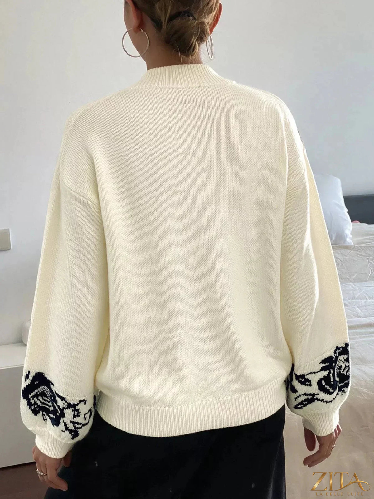 Zita La Belle Elite floral dropped shoulder sweater featuring a colorful floral pattern and relaxed fit, casual knitwear for women.