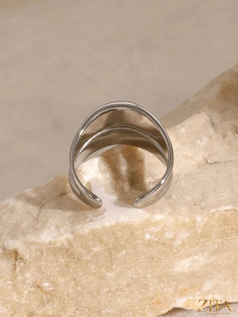 Stainless steel double-layered ring from Zita La Belle Elite, featuring sleek, polished metal bands stacked together.