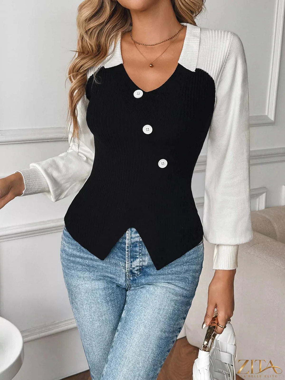 Color block V-neck sweater by Zita La Belle Elite featuring bold color sections and a classic fit, shown on a neutral background.