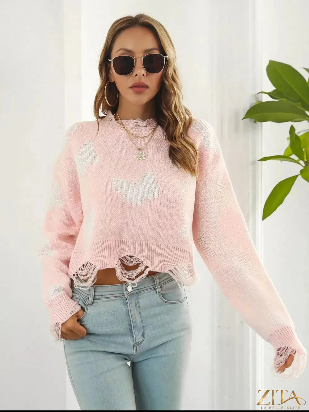 Zita La Belle Elite distressed butterfly cropped sweater featuring a faded design and lightweight knit, perfect for casual wear.