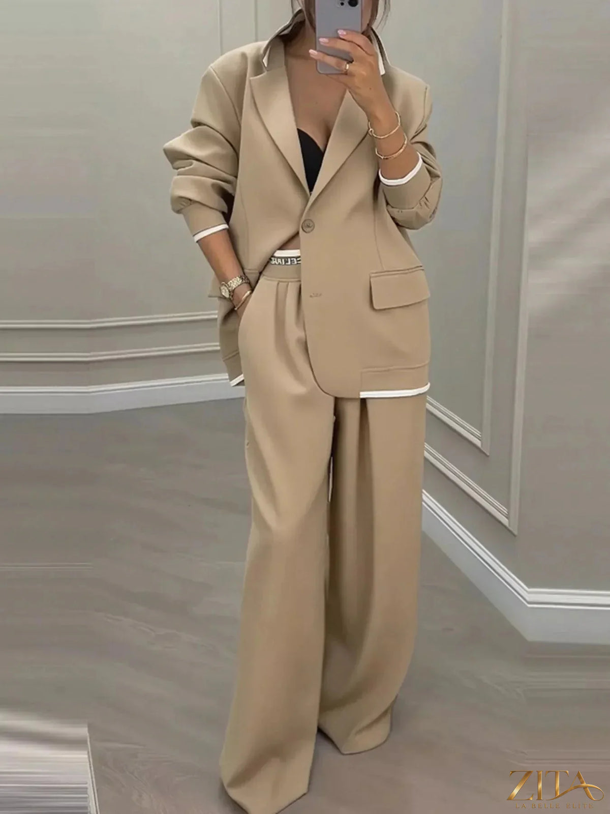 Plus size Zita La Belle Elite blazer and wide-leg pants set, featuring a single-button blazer and matching flowy trousers.