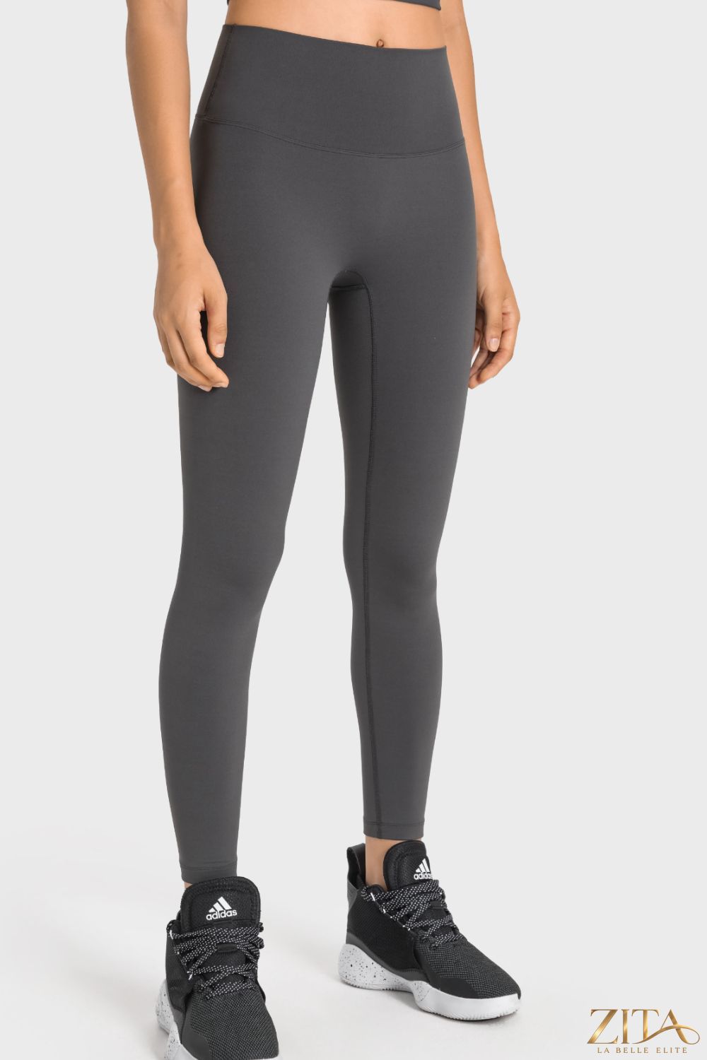 Women’s Millennia high-rise wide waistband yoga leggings in black, featuring a comfortable, stretchy fabric and stylish fit.