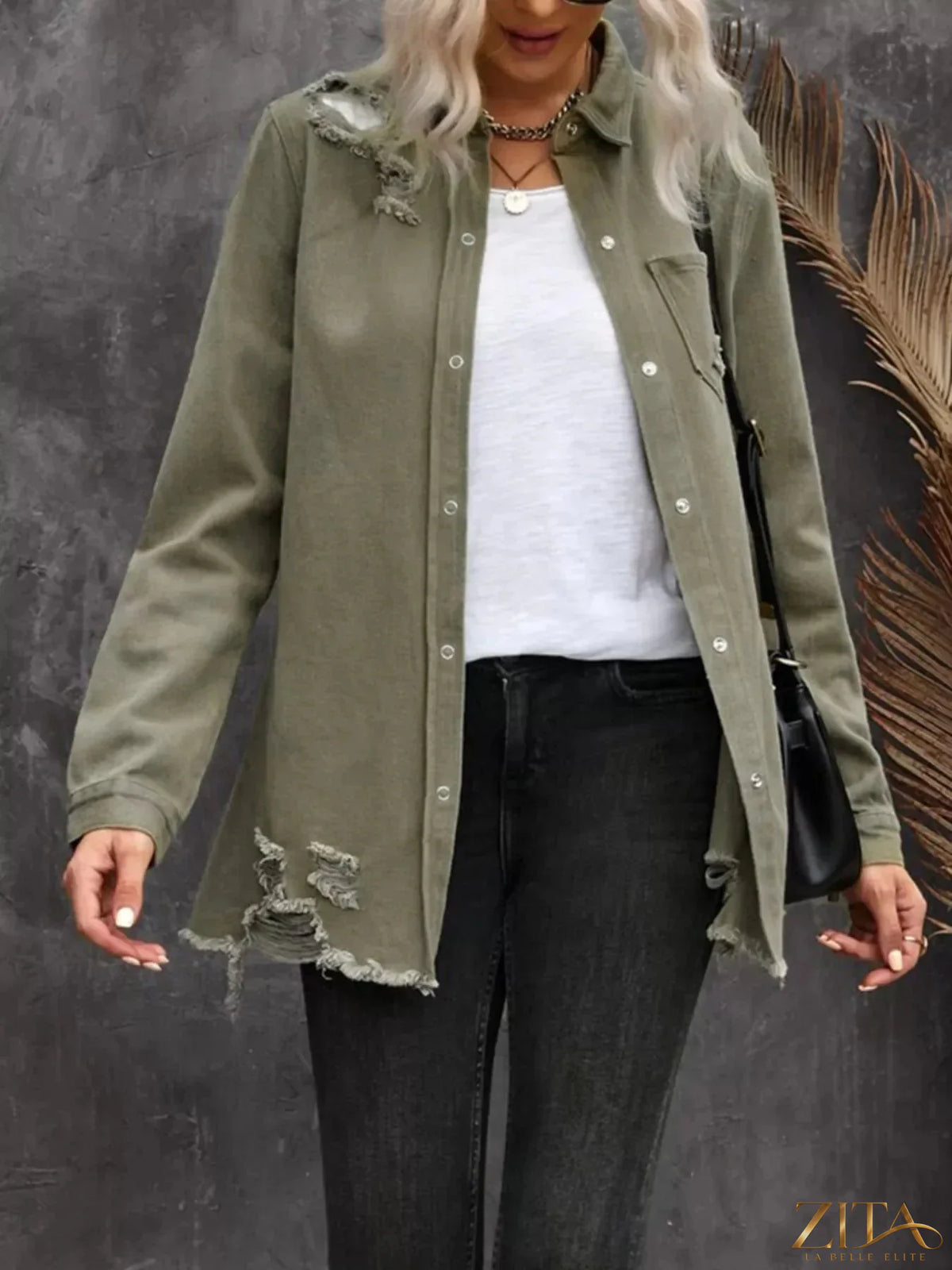 Zita La Belle Elite raw hem distressed denim shirt jacket with frayed edges and a casual fit, styled on a model.