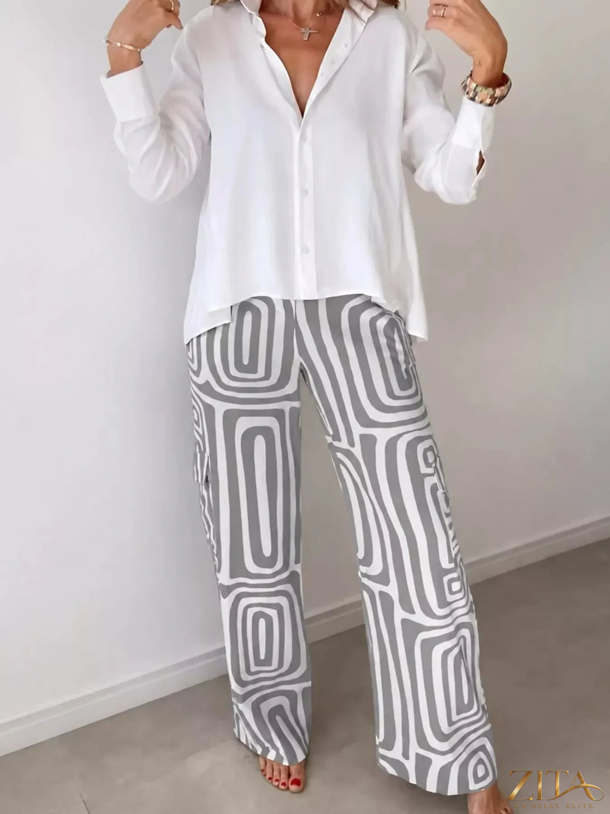 Plus size Zita La Belle Elite button-down shirt and geometric wide-leg pants set, shown in a stylish outfit.