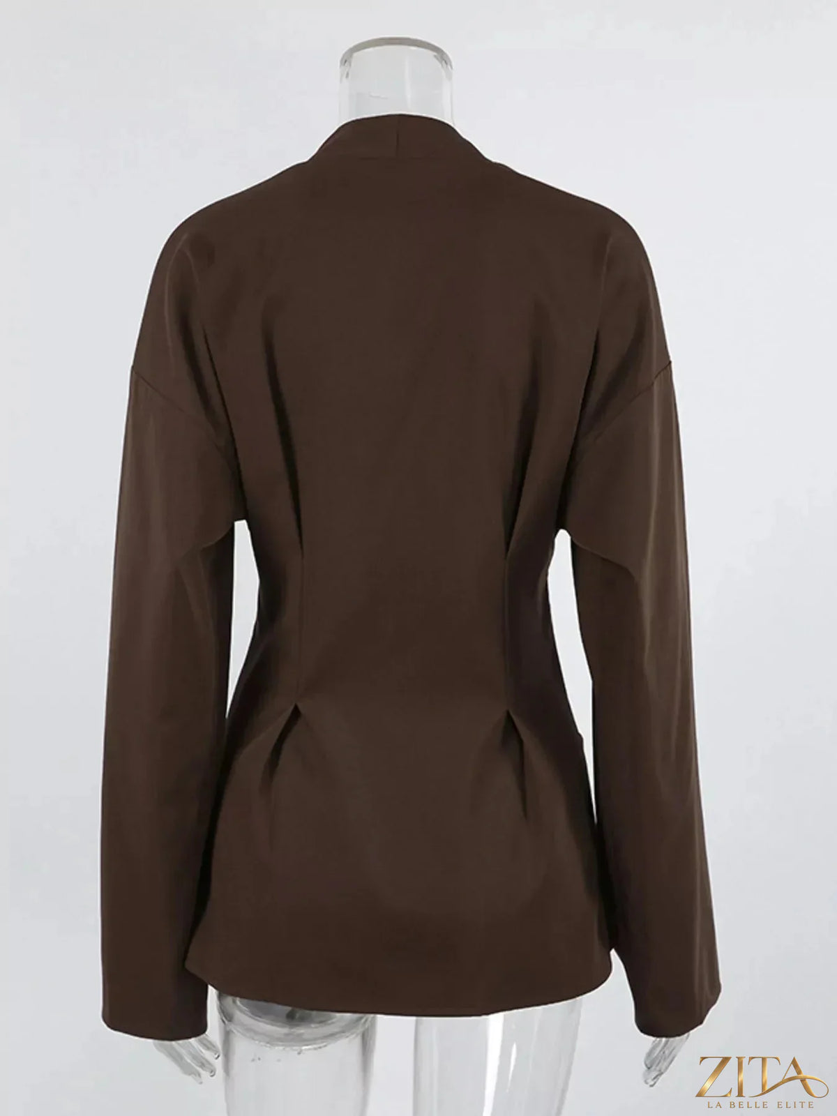 Zita La Belle Elite pleated waist blouse with button detail, featuring a stylish design and lightweight fabric.