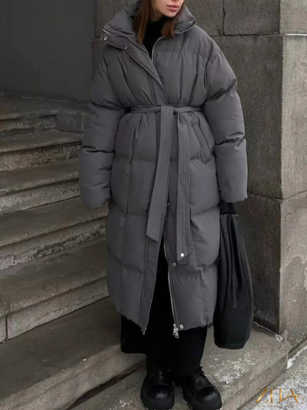 Zita La Belle Elite longline padded winter coat with belt, featuring a high collar and quilted design for warmth and style.