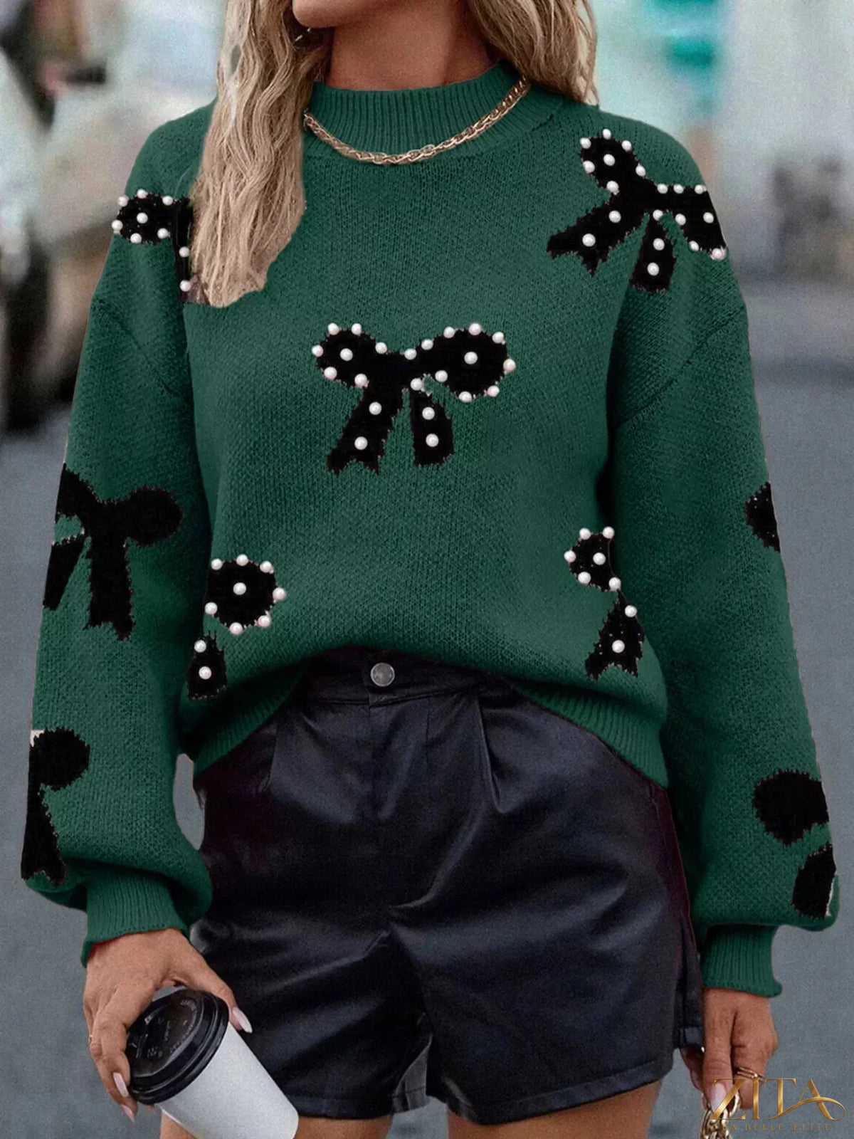 Zita La Belle Elite pearl bow-embellished long sleeve sweater in soft knit with elegant pearl details.