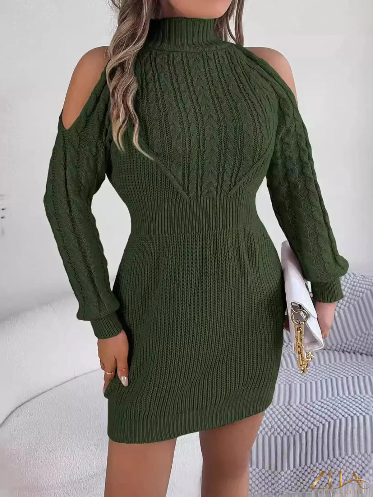 Cold shoulder cable knit turtleneck sweater dress from Trendsi featuring a cozy, fitted design with cut-out shoulders and ribbed texture.