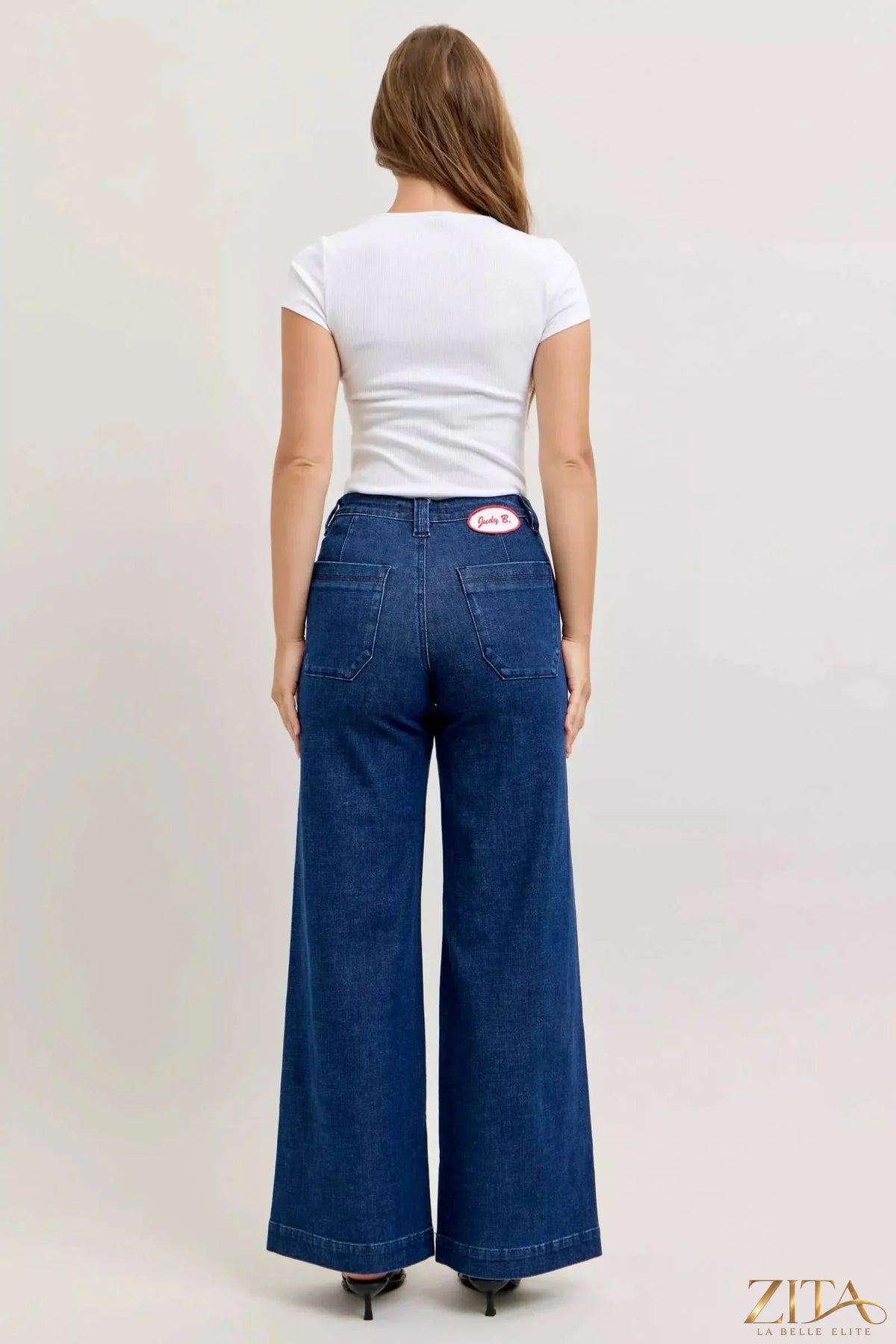 Zita La Belle Elite Judy Blue high-waisted retro wide-leg jeans displayed on a hanger with visible stitching and classic denim texture.