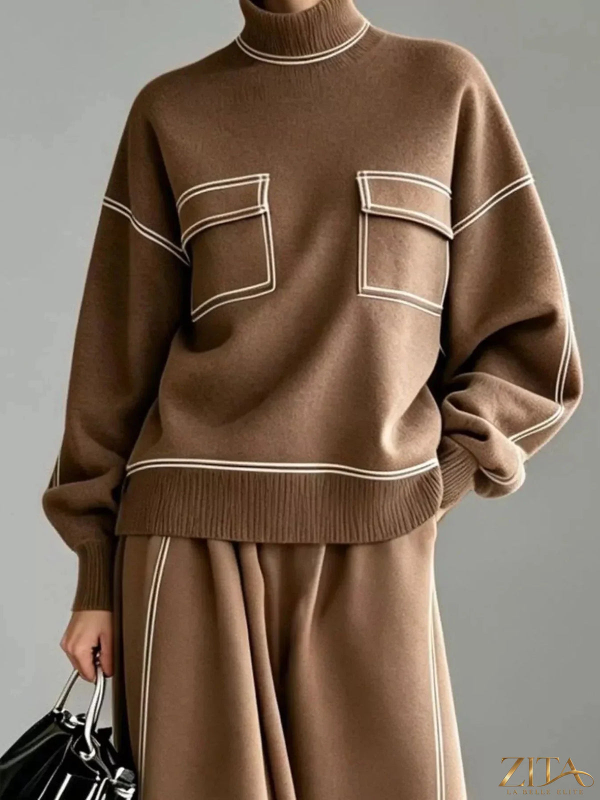 Zita La Belle Elite turtleneck knit top and midi skirt set, featuring a cozy knit fabric and stylish design, worn together.