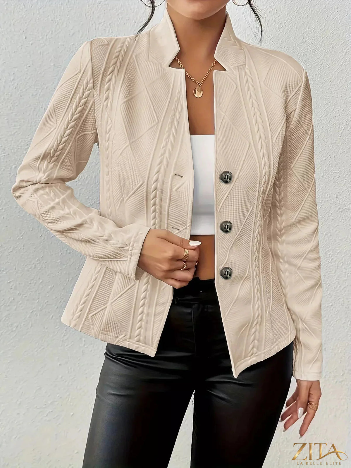 Zita La Belle Elite textured knit button-front blazer featuring a tailored fit and classic collar, shown on a model.