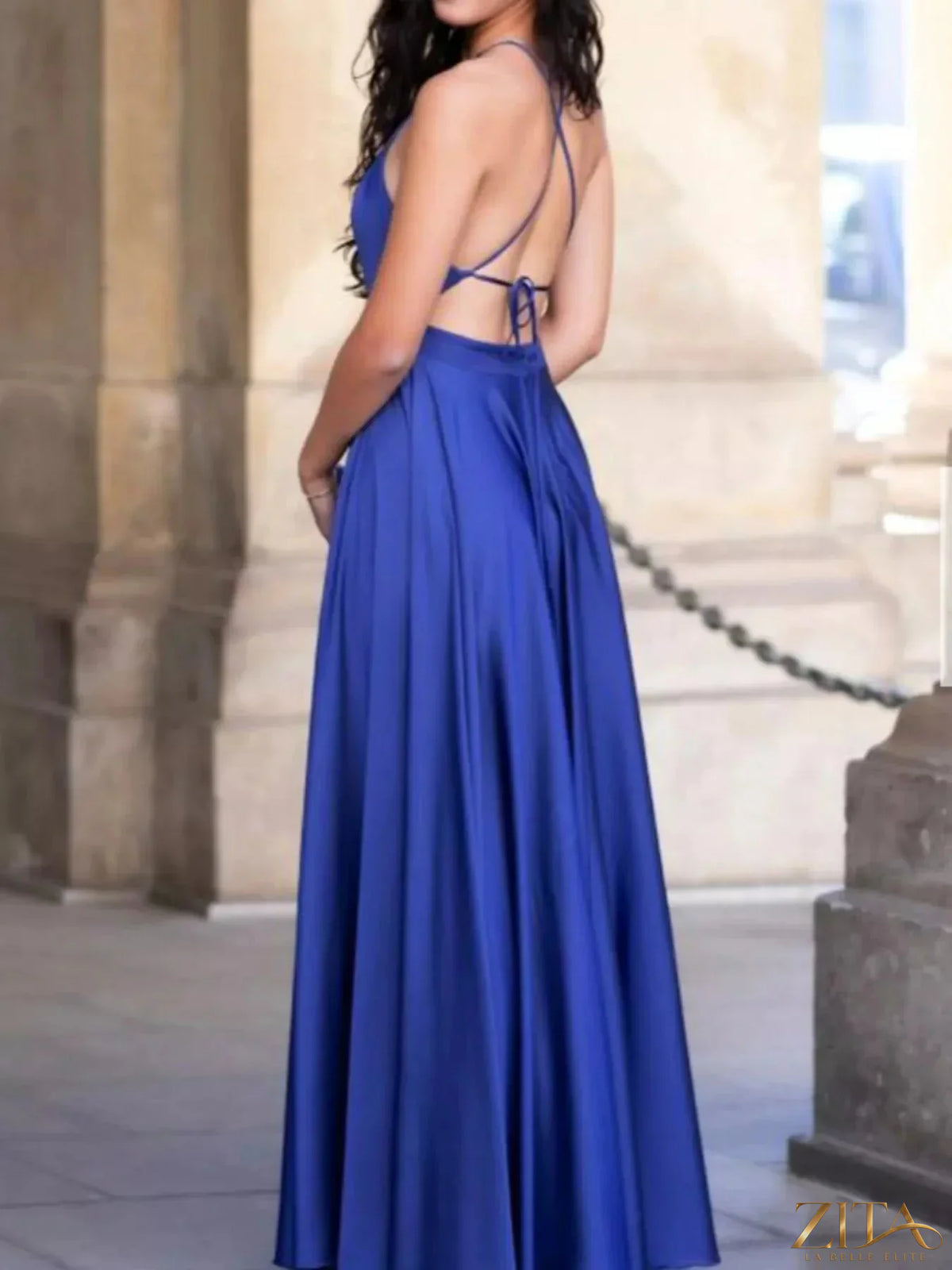 Zita La Belle Elite halter neck slit maxi dress in flowing fabric, featuring a fitted bodice and elegant slit design.
