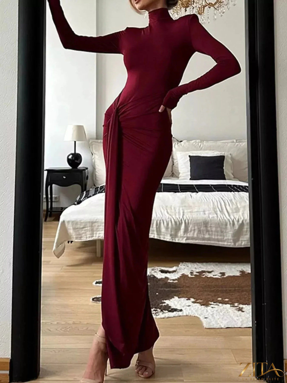 Nude turtleneck long sleeve slit maxi dress by Trendsi, flowing fabric, high slit, and fitted silhouette.
