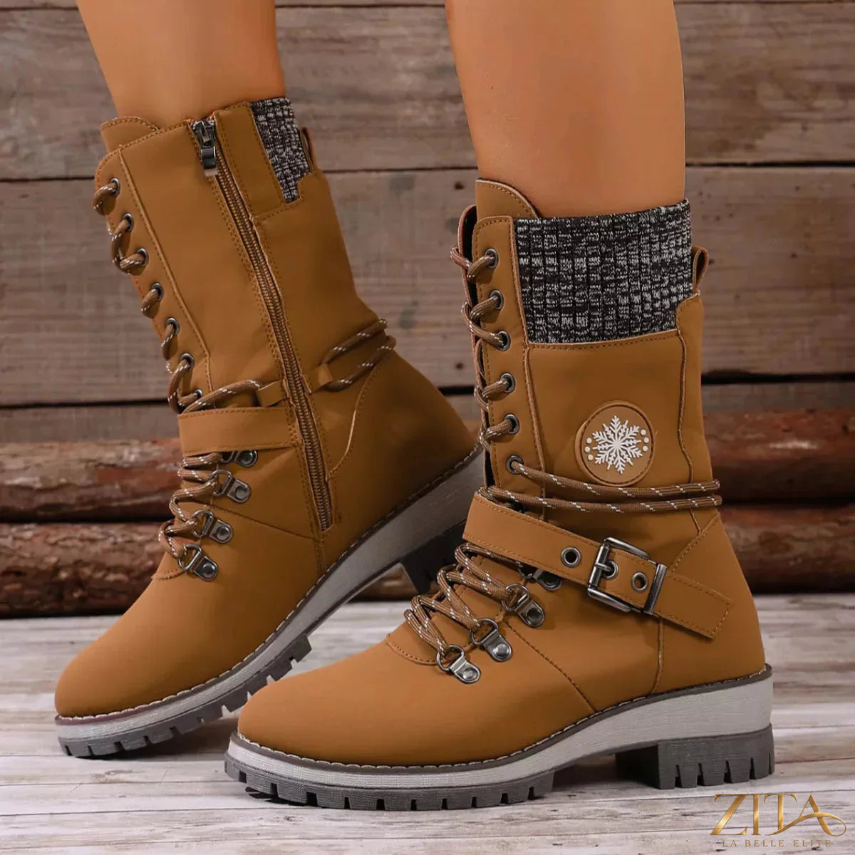 Black lace-up ankle combat boots by Trendsi with chunky soles and metal eyelets, styled with casual winter outfits.