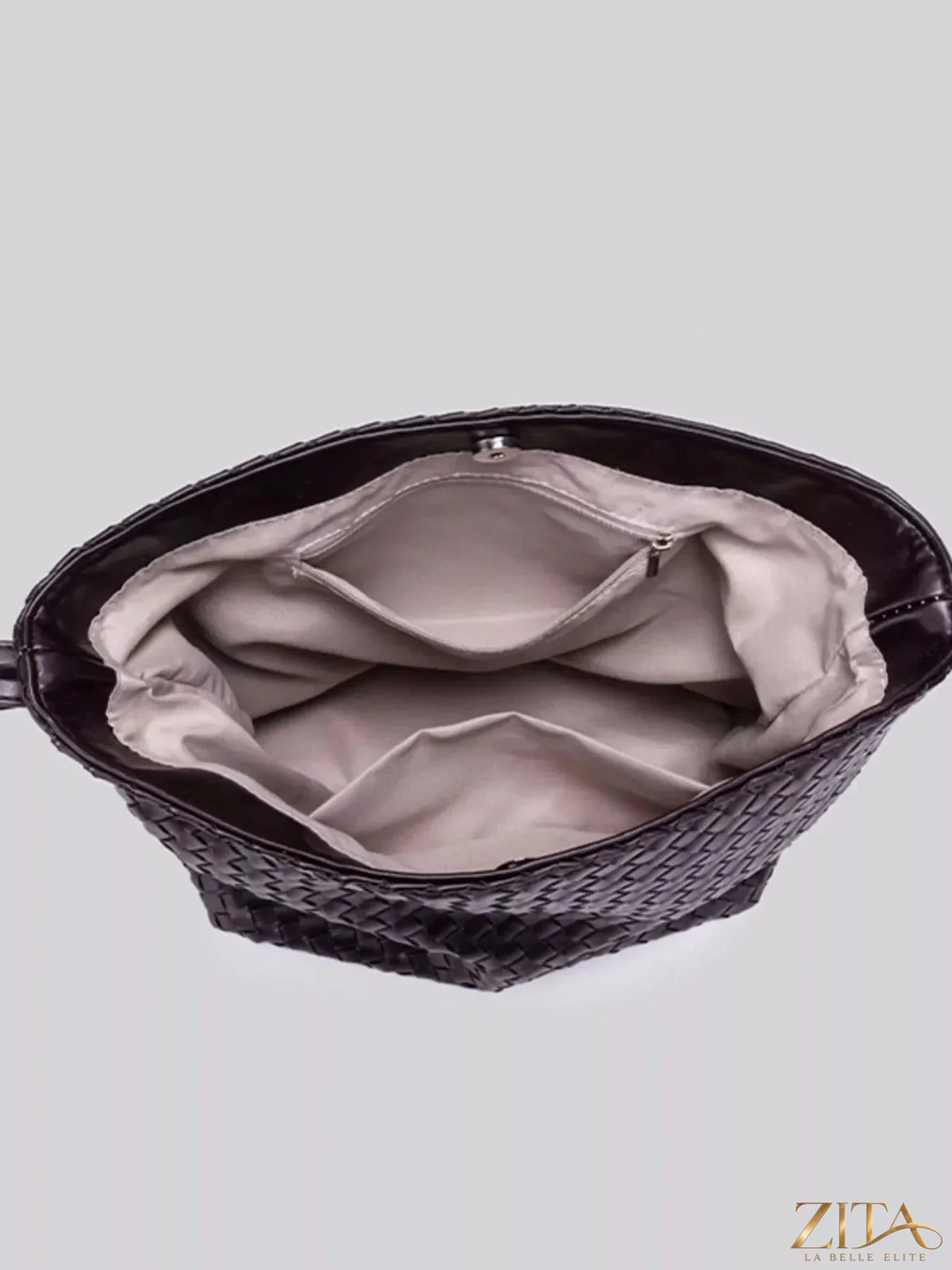 Woven leather hobo shoulder bag by Zita La Belle Elite with a slouchy design and adjustable strap, stylish for everyday use.
