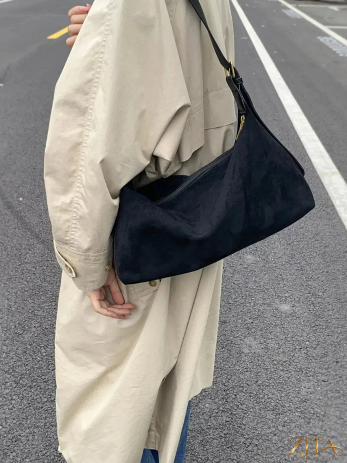 Zita La Belle Elite solid color suede hobo crossbody bag with a relaxed, slouchy design and adjustable strap.