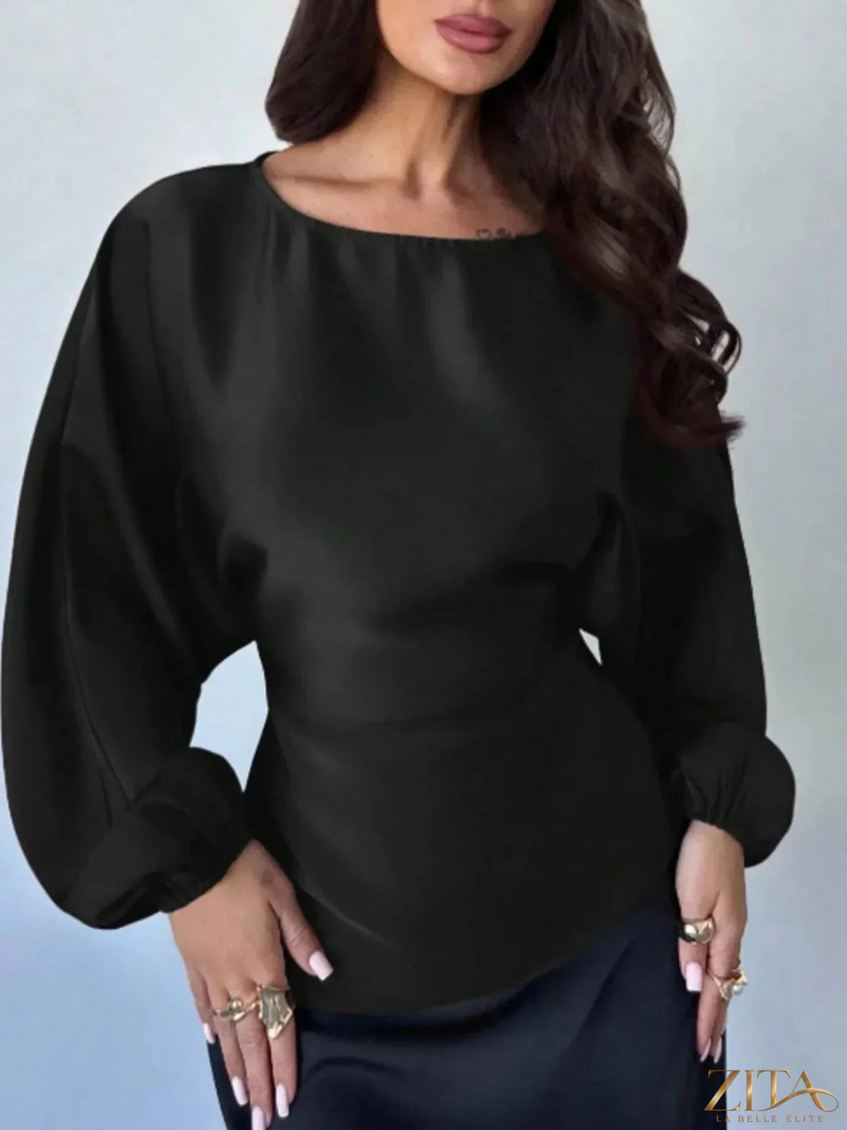 Zita La Belle Elite back tie long sleeve blouse, featuring a stylish design with a tied back and elegant long sleeves.