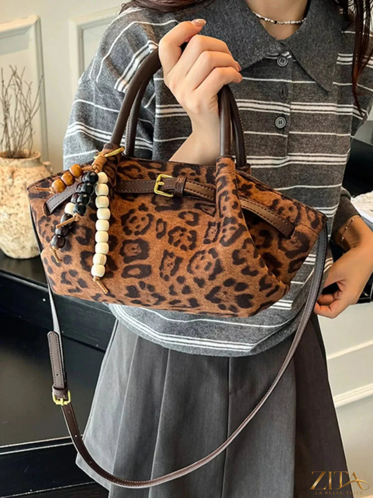 Zita La Belle Elite Buckle Decor Tote Bag with stylish buckle accents and spacious interior, black leather look, on white background.