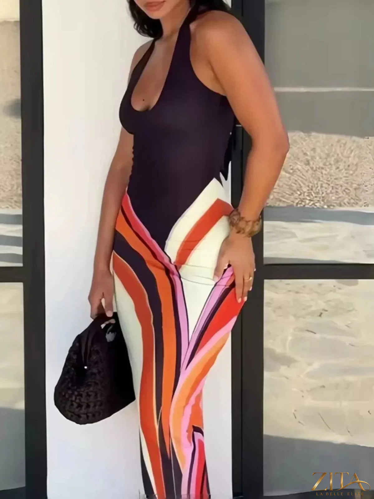 Zita La Belle Elite halter neck maxi dress with abstract print, flowing fabric, and stylish design perfect for summer or events.