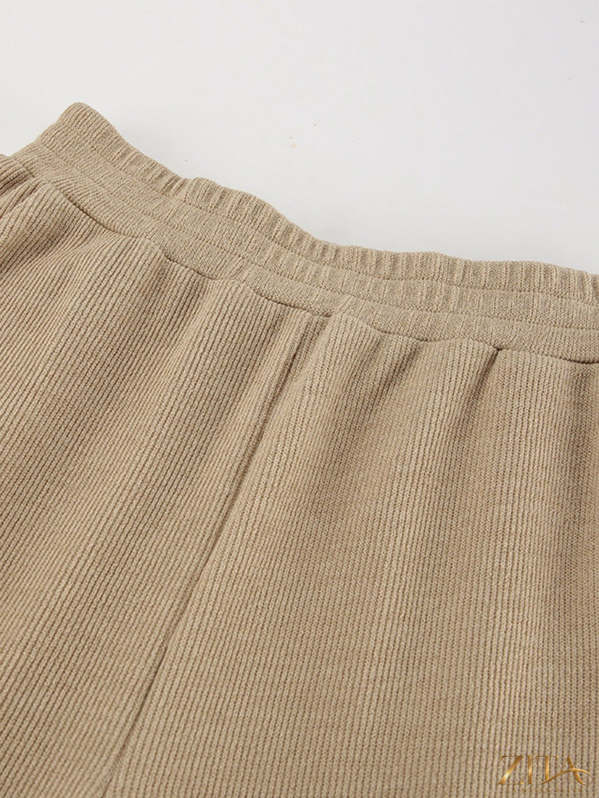 Trendsi turtleneck long sleeve top and matching pants set in soft fabric, shown in a neutral color on a model.