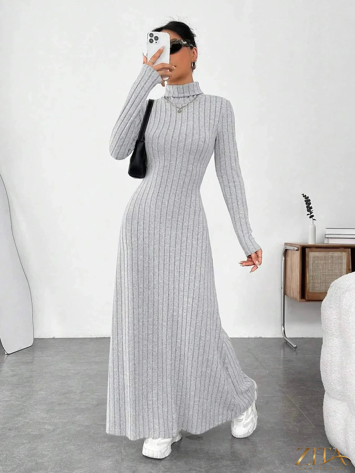 Ribbed black turtleneck long sleeve maxi knit dress from Trendsi, featuring a fitted silhouette and cozy ribbed fabric.
