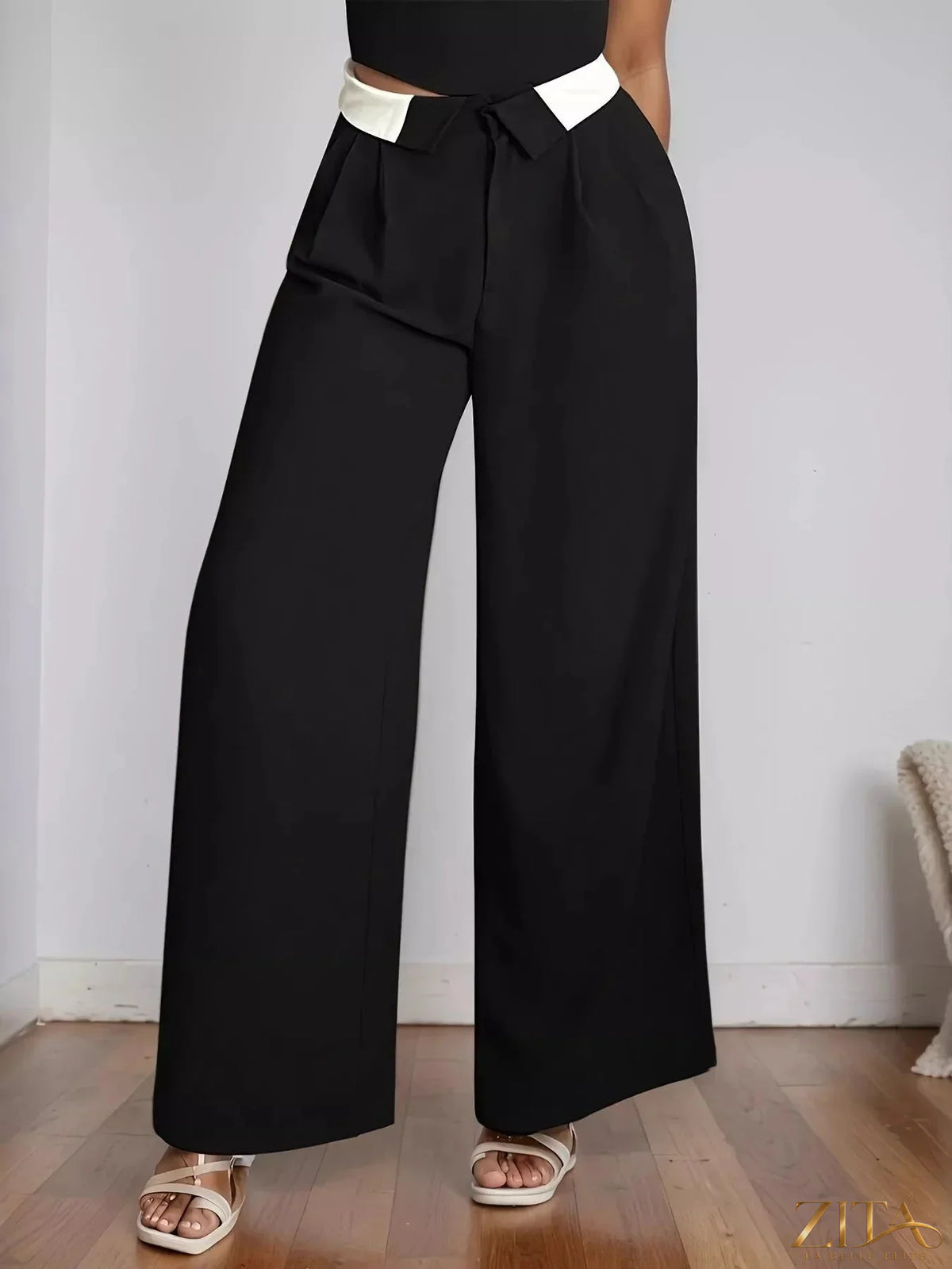 Zita La Belle Elite wide leg pants in a flowing fabric, shown in a natural pose, highlighting the relaxed fit and elegant style.