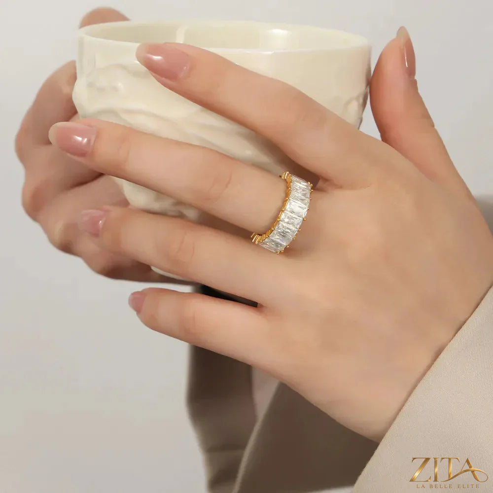 Titanium steel ring with inlaid zircon stones from Zita La Belle Elite, featuring a sleek design and sparkling accents.