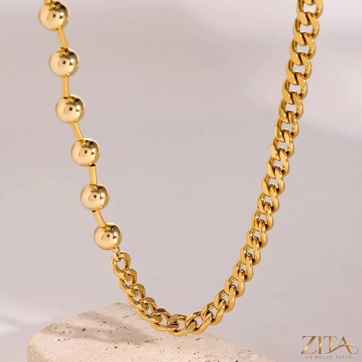 18K gold-plated toggle clasp necklace by Zita La Belle Elite, showcasing a stylish, shiny closure and delicate chain detail.