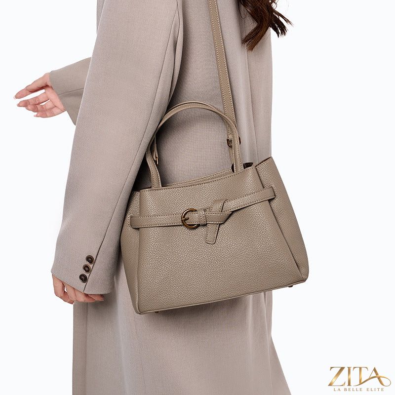 Zita La Belle Elite leather top handle handbag with structured design, featuring a smooth finish and elegant gold-tone hardware.