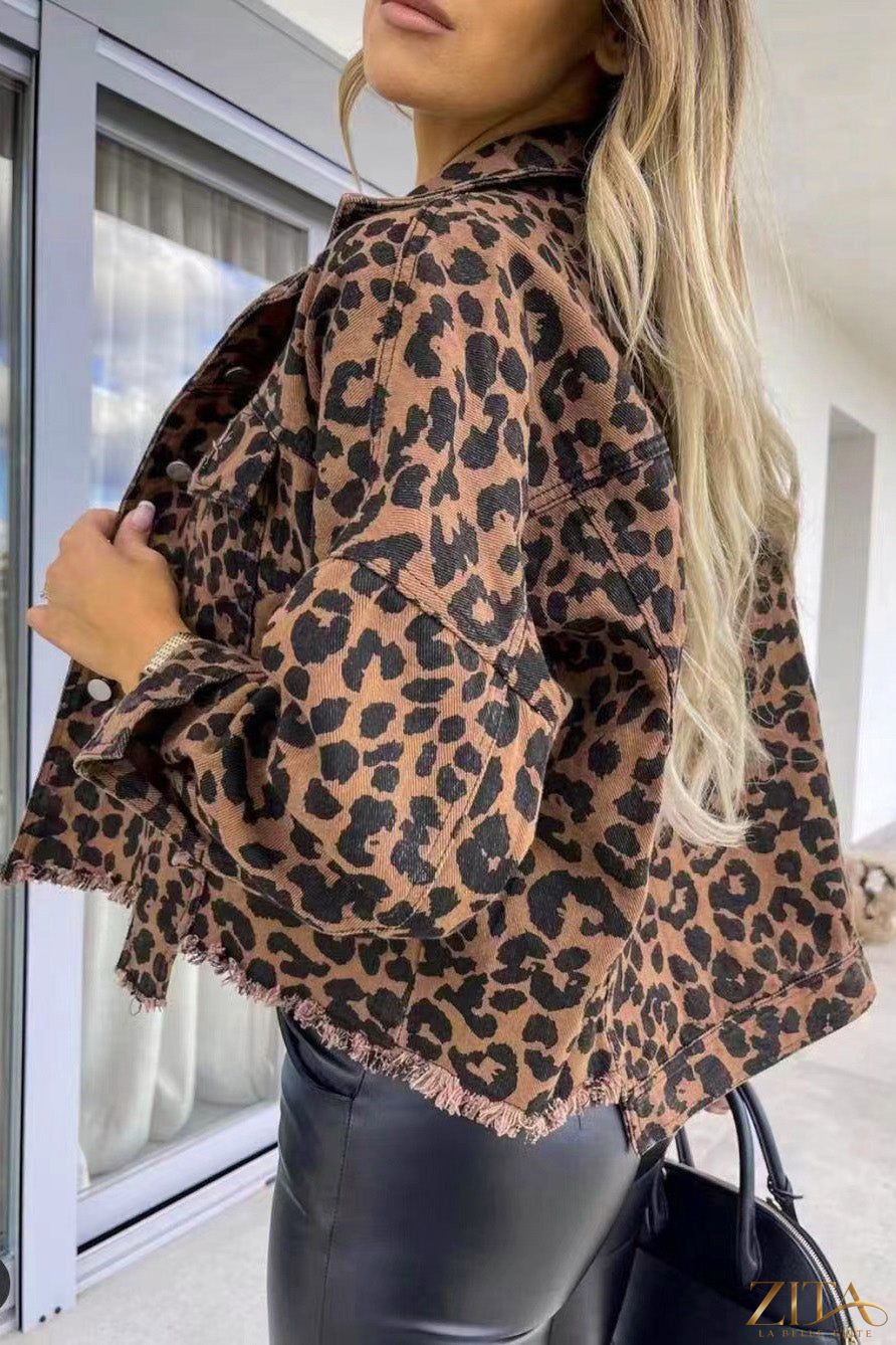 Leopard print raw hem denim jacket by Zita La Belle Elite, featuring a stylish leopard pattern and distressed hem detail.