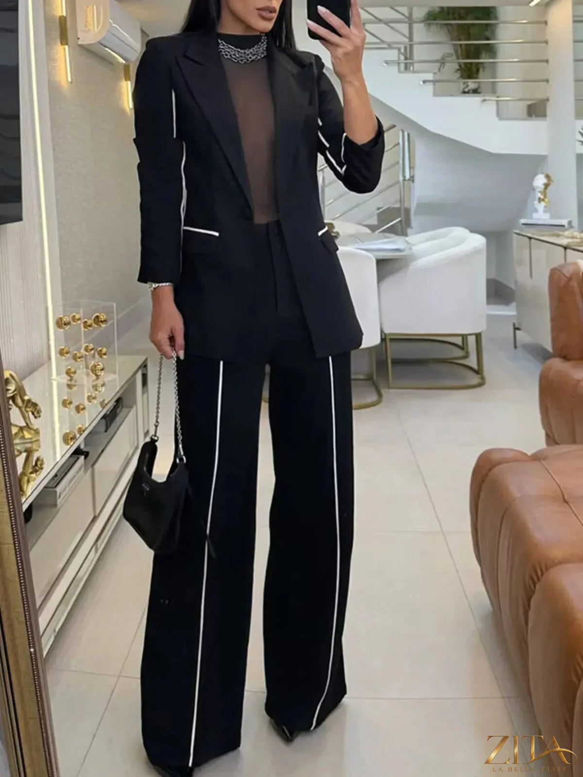 Zita La Belle Elite contrast trim blazer and wide-leg pants set, tailored with stylish detailing, on a white background.