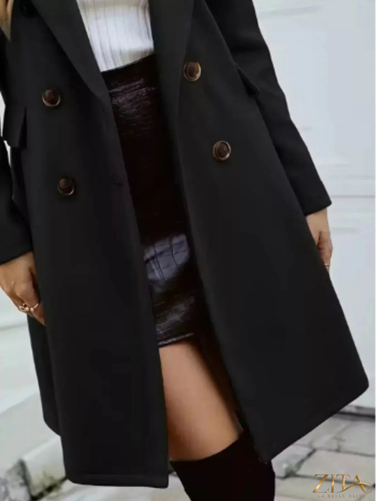 Zita La Belle Elite double-breasted longline coat in neutral fabric, tailored with wide lapels and a sleek silhouette.