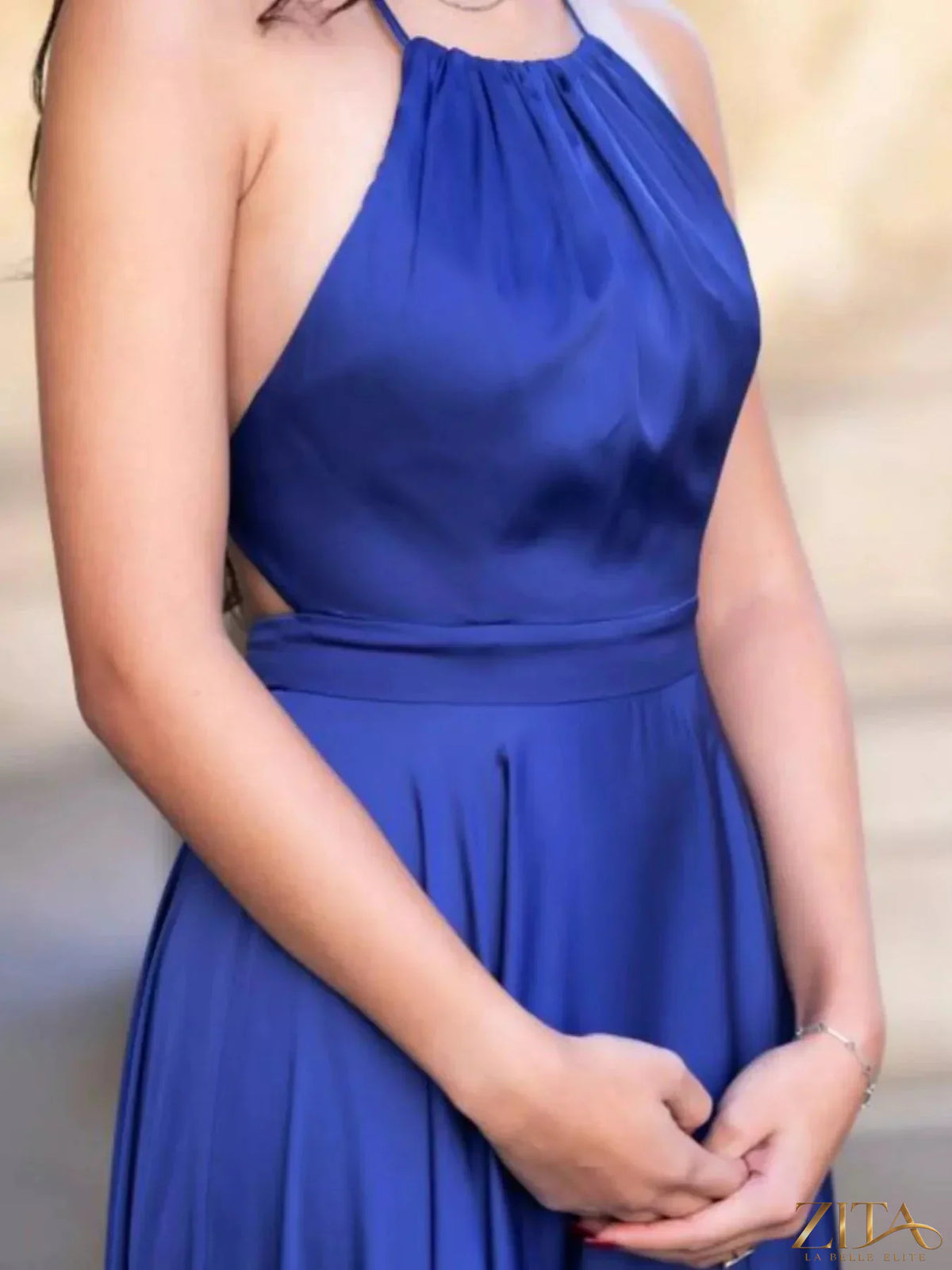 Zita La Belle Elite halter neck slit maxi dress in flowing fabric, featuring a stylish open back and elegant design.