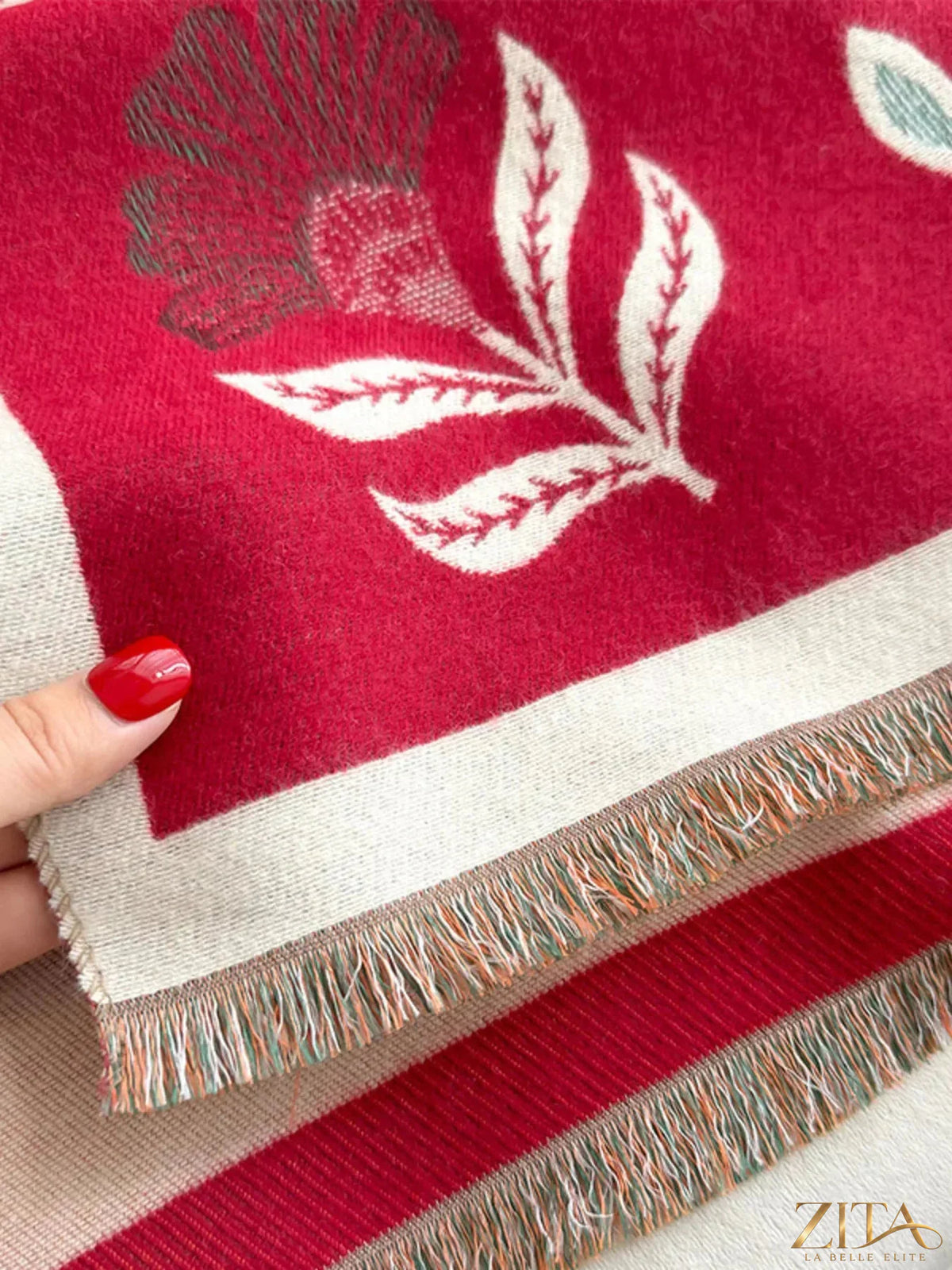 Printed raw hem shawl by Zita La Belle Elite featuring a stylish design and soft fabric, displayed flat in the image.