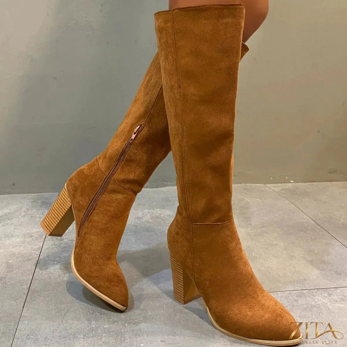 Zita La Belle Elite point toe block heel boots with sleek design and stylish silhouette on a white background.