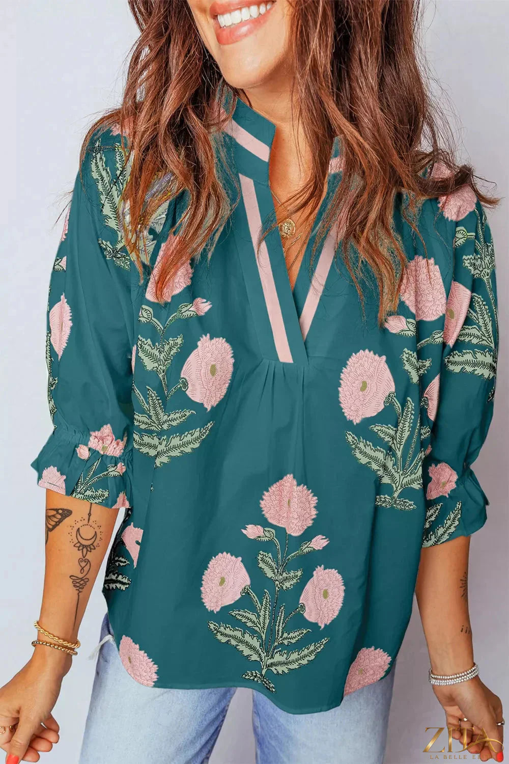 Floral embroidered notched blouse by Zita La Belle Elite featuring intricate floral embroidery and a stylish notched neckline.