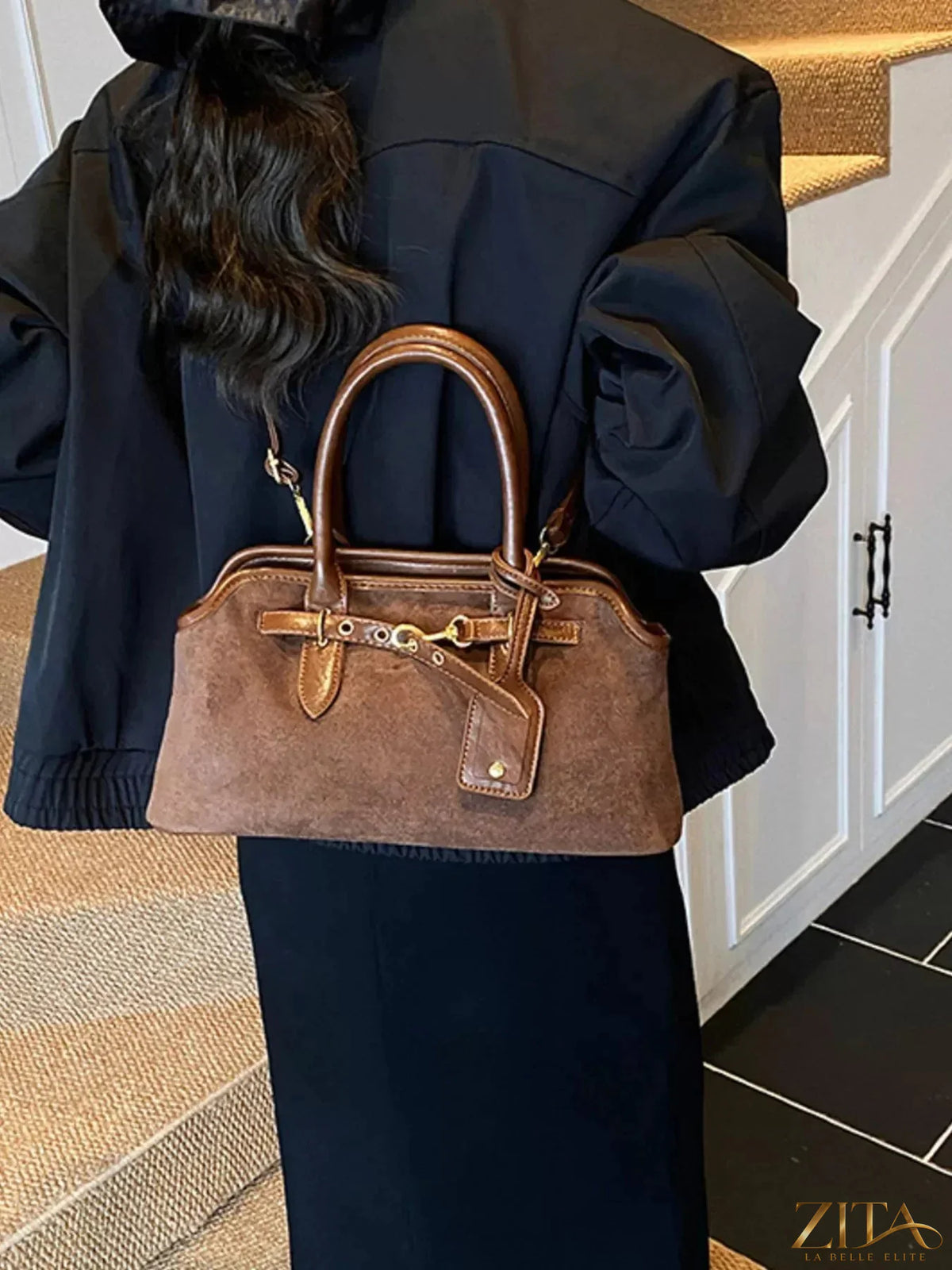 Vintage buckle detail handbag by Zita La Belle Elite featuring classic design and leather straps.