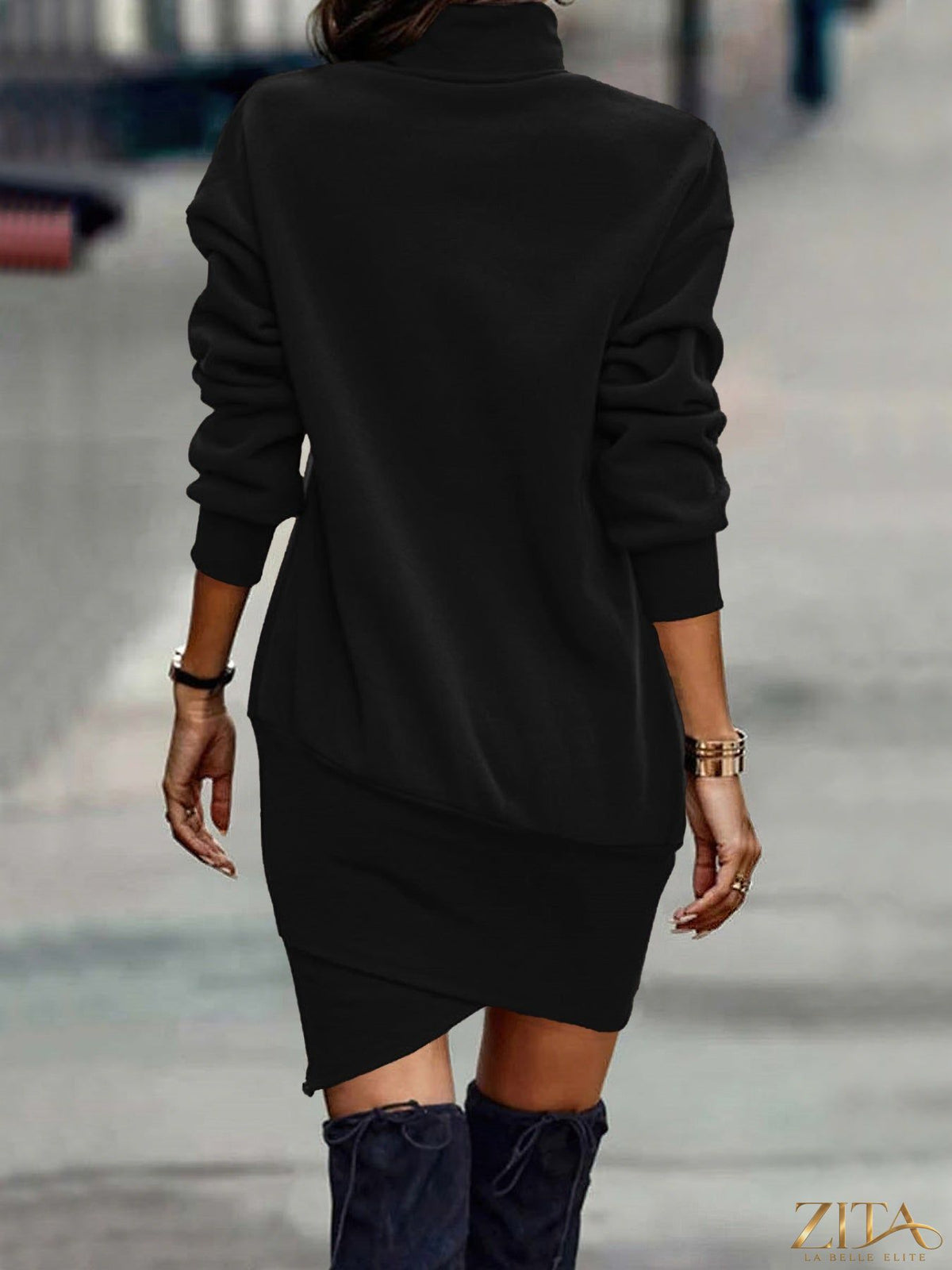 Black turtleneck long sleeve mini dress with asymmetrical hem from Trendsi, showcasing a sleek and modern silhouette.