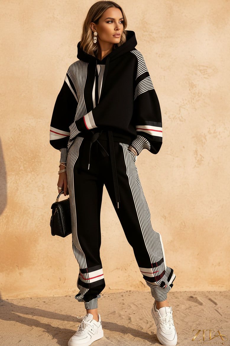 Color-block stripe-panel hoodie and jogger set by Zita La Belle Elite, featuring vibrant color blocks and comfortable fit.