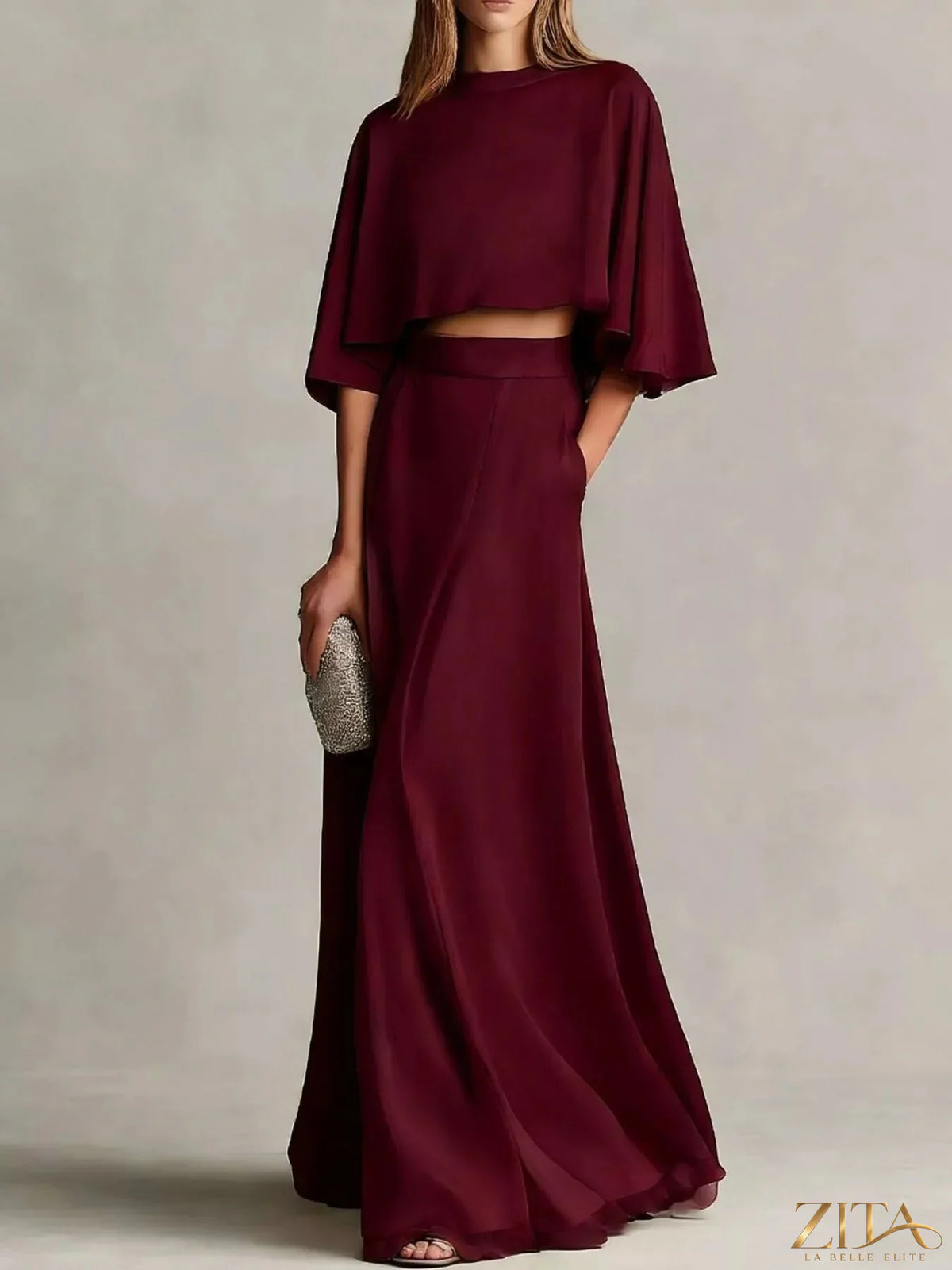Plus size satin crop top and maxi skirt set by Zita La Belle Elite, featuring a stylish two-piece satin ensemble.