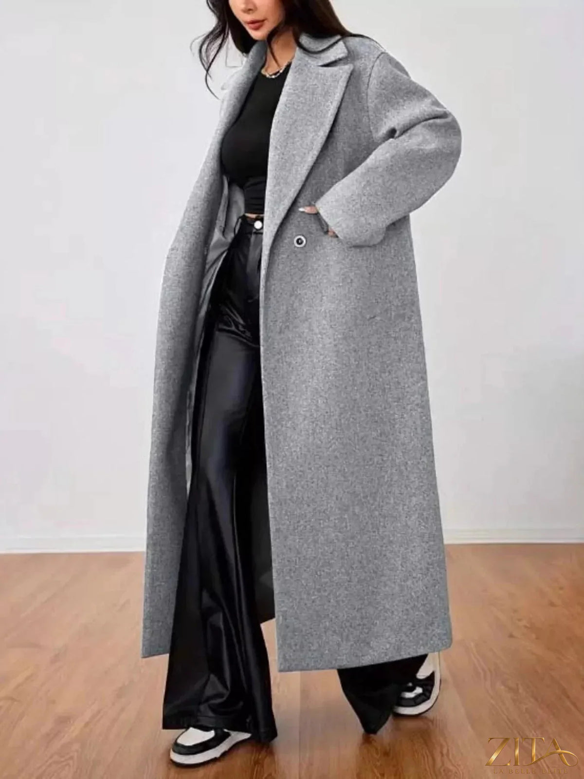 Zita La Belle Elite wool-blend longline overcoat in neutral color, tailored fit with lapel collar and side pockets.