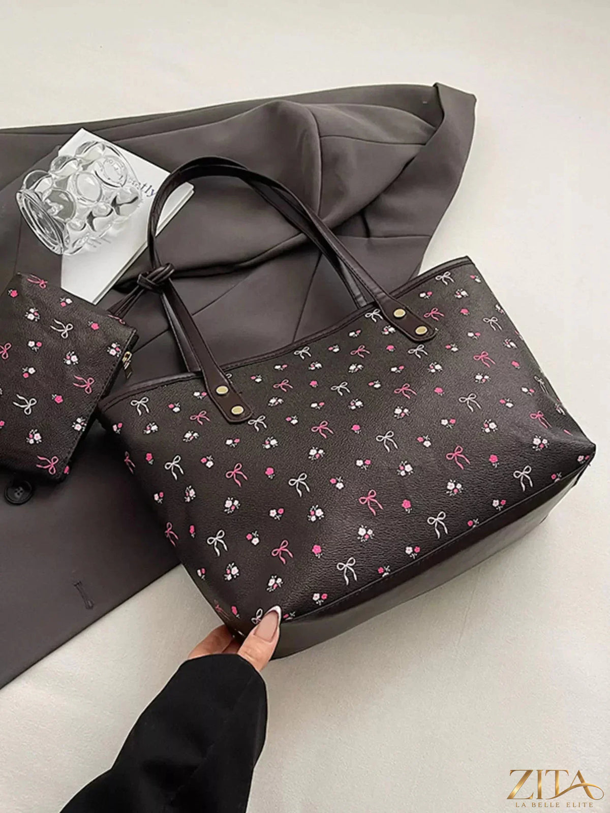 Printed tote shoulder bag with matching pouch from Zita La Belle Elite, featuring vibrant floral design and sturdy handles.